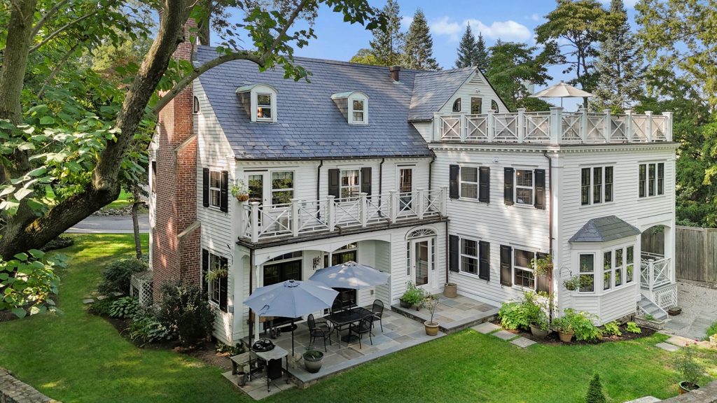 At the end of a cul-de-sac in the landmarked Fieldston community stands this exceptional colonial revival home. 5022 Waldo is distinguished by its superior quality, unique character, and seclusion. Set on a half-acre double lot, this hillside location provides both privacy and stunning views from the roof deck.